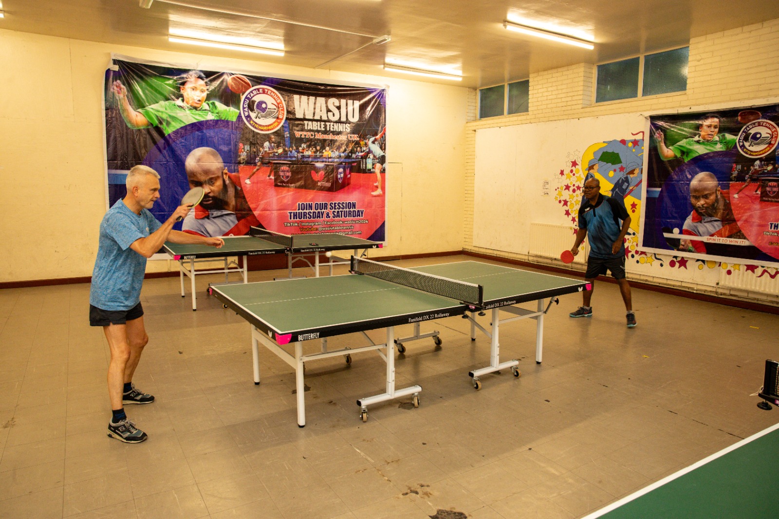 Two club members playing table tennis