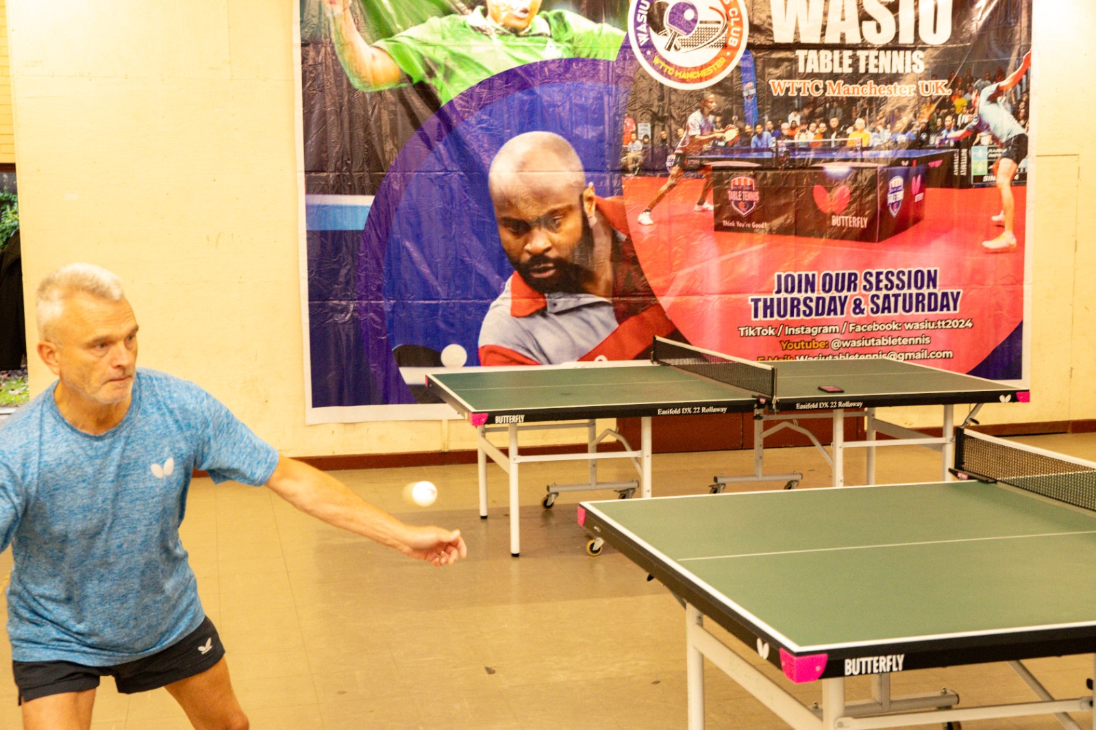 A player returning the ball at Wasiu Table Tennis